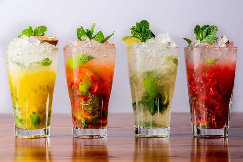 different-mojitos-on-a-wooden-table-how-many-types-of-mojitos